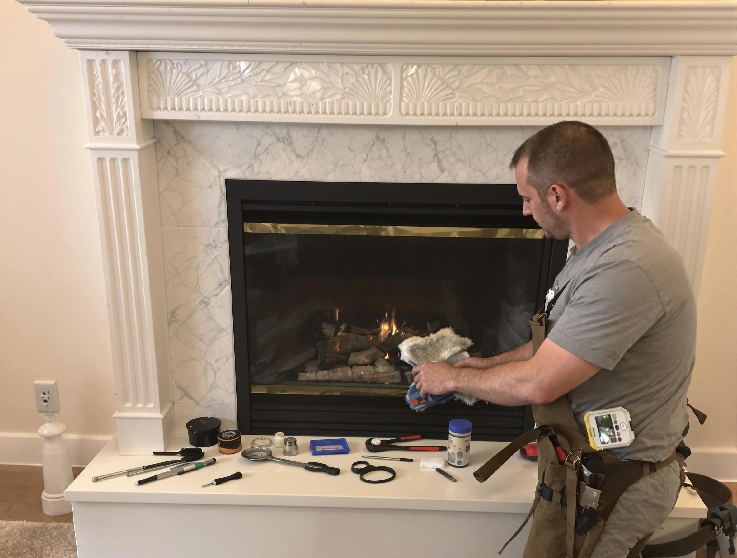 Cambridge Chimney Sweep performing fireplace maintenance in Cambridge, MA